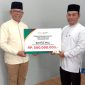 Bank Aceh Syariah Cabang Calang Menyerahkan Zakat Kepada Baitul Mal Aceh Jaya