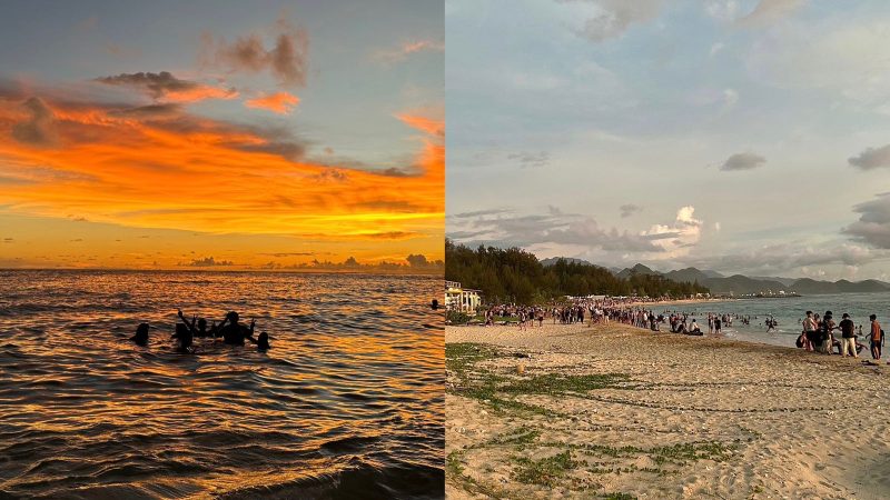 Sejumlah pengunjung menikmati suasana pantai dan mandi laut saat senja di kawasan Pantai Lhoknga, Aceh Besar, Minggu (13/4/2026).